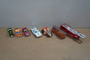 lot 146 image: Mid-Scale Matchbox Cars - Days of Thunder Haulers