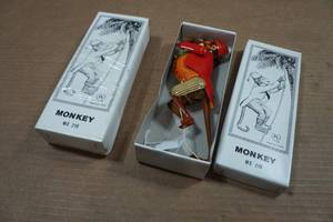 lot 198 image: 2 Vintage Look Tin Litho Climbing Monkeys