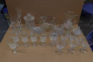 lot 252 image: Assorted Clear Glassware - Pitcher, Wine Glasses, Flutes, Dishes