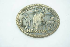 lot 191 image: Vintage Eighth Edition Collectors Buckle National Finals Rodeo 1982 Hesston