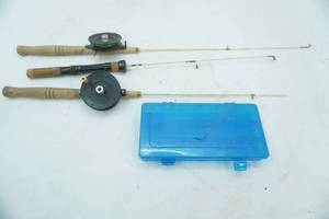 lot 215 image: ice fishing jigs and small tackle organizer (one broken tip)