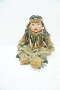 lot 222 image: Collectible Native American Porcelain Doll 13 sitting