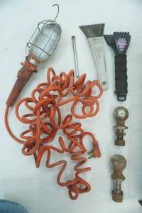 lot 91 image: Trailer Hitch Balls, Treble Light, Ice Scrapers, Air Pressure Gauge