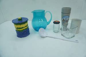 lot 103 image: Blue Poly Pitcher, Soup Ladle, Pottery Canister, Vases