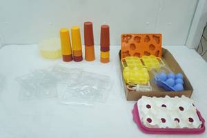 lot 113 image: Tupperware Tumblers, Baking Molds, Candy Molds, Eggs and more