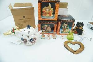 lot 120 image: Vintage Ceramic Halloween Village Lighted Houses, American Flag Candle Holder Tea Kettle and more
