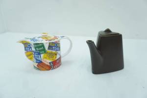 lot 129 image: Paul Cardew World Tea Porcelain Teapot Design Pac matte brown triangular stoneware teapot