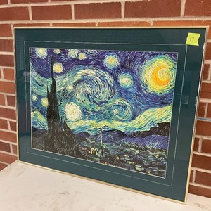 lot 17 image: Colorful framed art work.