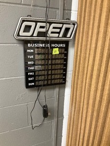 lot 63 image: Open sign with business hours