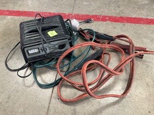 lot 216 image: Battery Charger and jumper cables