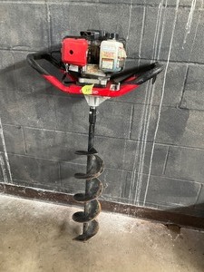 lot 219 image: Predator earth auger