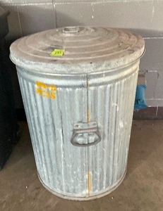 lot 237 image: Metal trash can filled with floordry