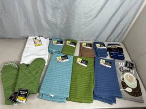 lot 52 image: Assorted New Kitchen Towels, Pot Holders, Apron, Dish Cloths, and More