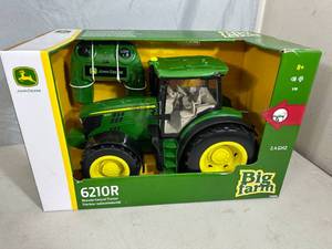 lot 84 image: New John Deere Remote Control Tractor