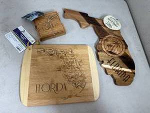 lot 87 image: Assorted New Florida Themed Bamboo Coasters, Cutting Boards, Serving Board