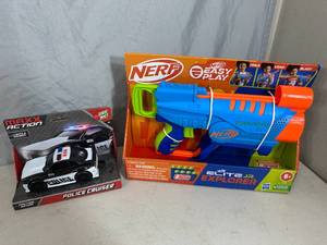 lot 97 image: New Nerf Gun and Police Cruiser Toy Car