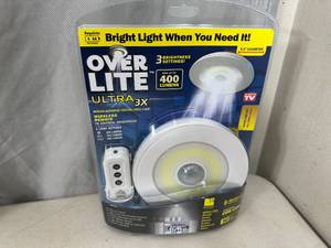 lot 296 image: New Over Lite Remote Controlled  Motion Activated Light Fixture