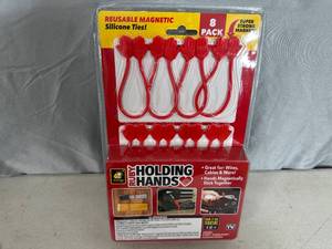 lot 319 image: New 8 Pack of Ruby Holding Hands Magnetic Silicone Ties  Organizers