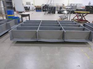 lot 676 image: GRAY METAL SHELVING UNIT - TRIPLE WIDE