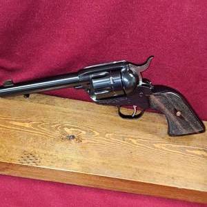 lot 47 image: Ruger New Vaquero, Custom Walnut Grips, Stage 3 Pioneer Action Job 357 Mag, 5 12 Barrel, 95% Condition Revolver