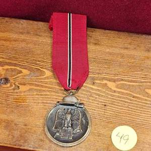 lot 49 image: Original German Eastern Front Medal Winter Campain, Nov 15,1941-April 15, 1942
