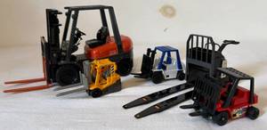 lot 51 image: Collection of 5 Toy Forklifts