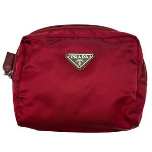 lot 35 image: Prada Red Nylon Cosmetic Pouch  Pre-Owned Retail $450