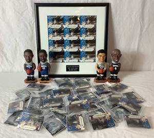 lot 18 image: Minnesota State Lottery MN Timberwolves Kevin Garnett Y2KG Framed Video Card and  Minnesota Timberwolves Bobbleheads with Bobblehead Poster