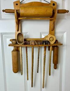 lot 7 image: Vintage Kitchen Wall Holder with Rolling Pins and Assorted Kitchen Tools