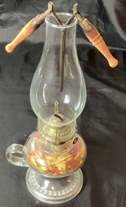 lot 86 image: Vintage Chamber Kerosene Lamp with Glass Chimney and Vintage Curling Iron