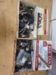 lot 49 image: Lot of Vintage Electrical Switches, Plugs, and Outlets in Cigar Boxes