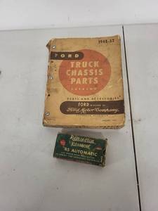 lot 78P image: 1948-52 Ford Truck Chassis Parts Catalog and Remington Kleanbore .45 Automatic Empty Box