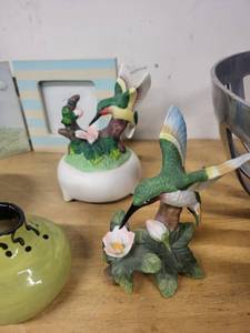 lot 15AW image: Mixed Home Decor Lot Metal Fruit Bowl, Hummingbird Figurines, and Pottery Pieces