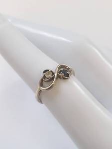 lot 39Q image: Sterling Silver Infinity Ring with Blue and White Stones