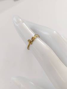 lot 54Q image: Gold-Tone Sterling Silver Love Ring