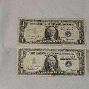 lot 24 image: 4-1957 $1 Silver Certificates