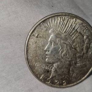 lot 25 image: 1922 D Peace Dollar wToning