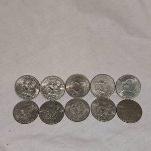 lot 30 image: 10 Assorted Ike Silver Dollars 1971-1978