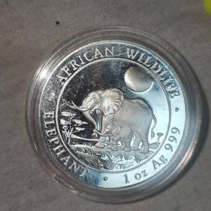 lot 77 image: 2011,100 Schillings, African Elephant 1oz Silver