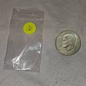 lot 42 image: 1971 S Ike Silver Dollar, 40%