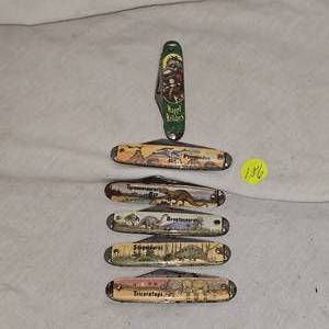 lot 186 image: 5 Dinasaur Knives and 1 Happy Holidays