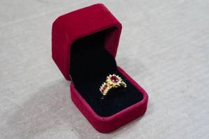 lot 204 image: Gold Tone Ring with Red Stones - Size 8