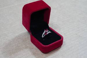 lot 205 image: Silver Tone Ring with Red Stone - Size 8