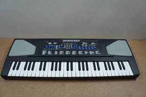 lot 313 image: Techno-Beat Electronic Keyboard