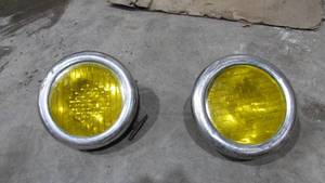 lot 20 image: (2) Vintage 10 Car Lights and (2) Oil Coolers