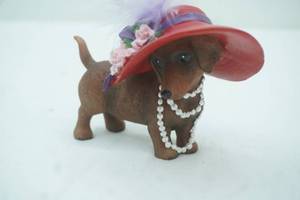 lot 30 image: Hamilton Collection Red Hot Mama Dachshund Figurine - Divas with Hattitude Collection