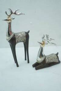 lot 85 image: Reindeer Figurines. Plated metal and Wood. 10 & 6 tall