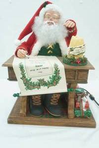 lot 163 image: Vintage Holiday Creations Animated Musical Writing Santa Figurine