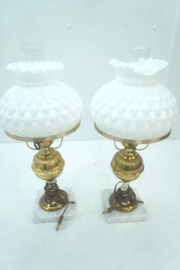 lot 180 image: Pair of Hurricane-Style Lamps. Featuring a white, diamond quilted milk glass shade