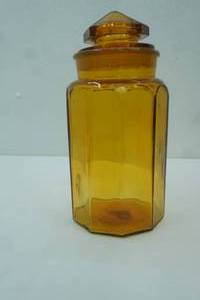 lot 250 image: Vintage L.E. Smith 10-Panel Amber Glass Apothecary Canister. 12 tall